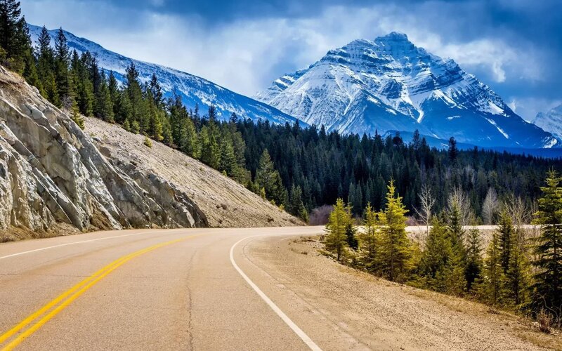 Curved Road in Mountains — Blue, Dramatic
