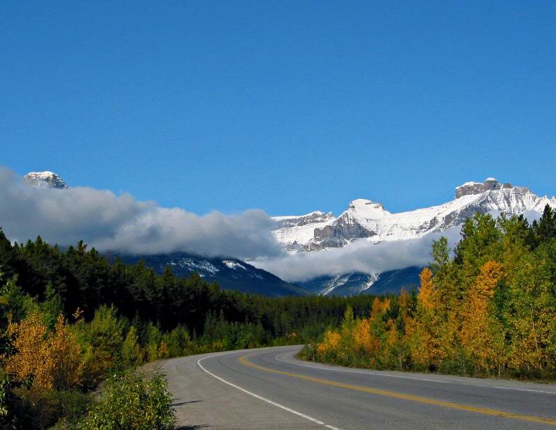 Curved Road in Mountains — Blue