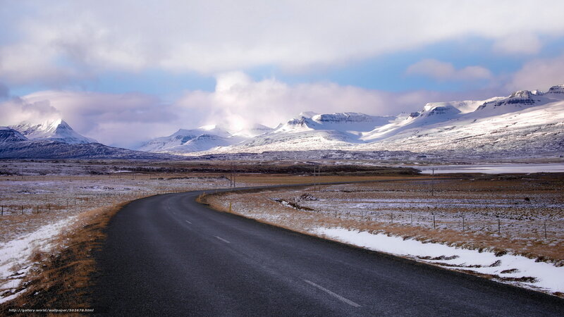 Curved Road in Snowy Landscape