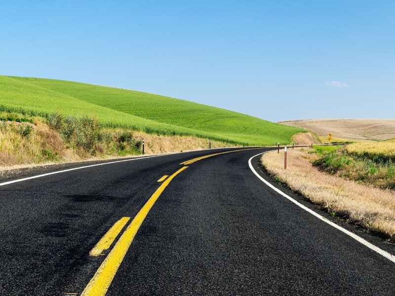 Curved Road Through Fields — Black, Serene, Afternoon, Photograph
