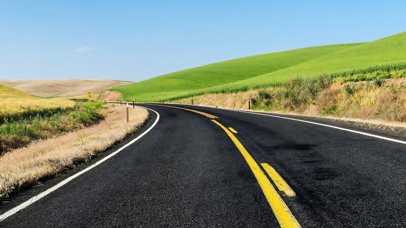 Curved Road Through Hills
