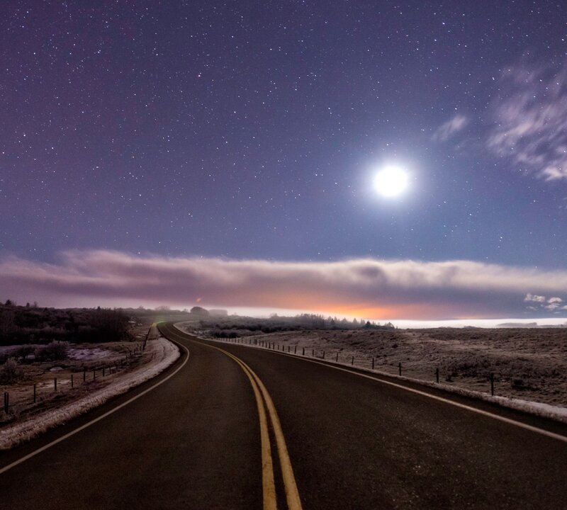 Curved Road under Moonlight