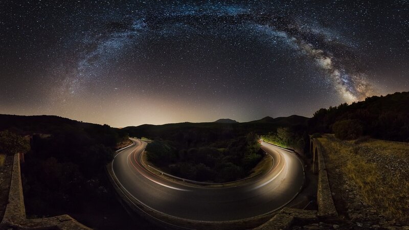 Curved Road under Stars