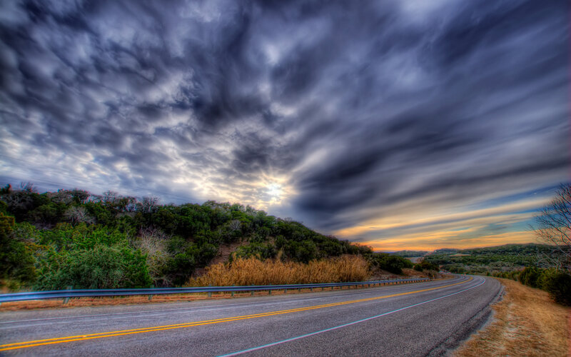 Curved Road under Stormy Sky — Gray, Dramatic