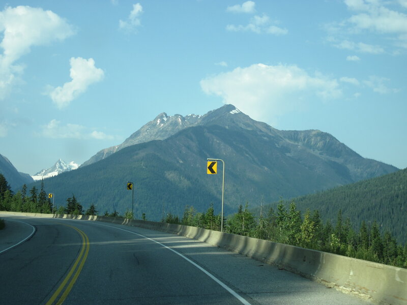 Curved Road with Mountains — Blue