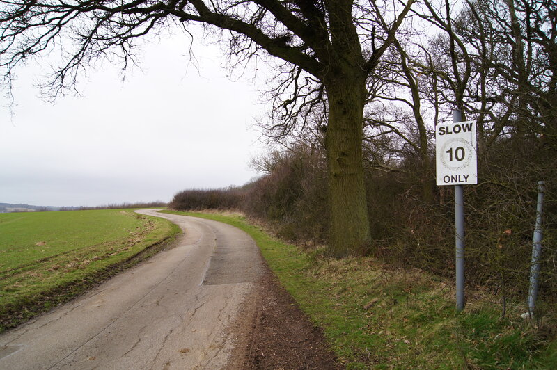 Curved Road with Sign