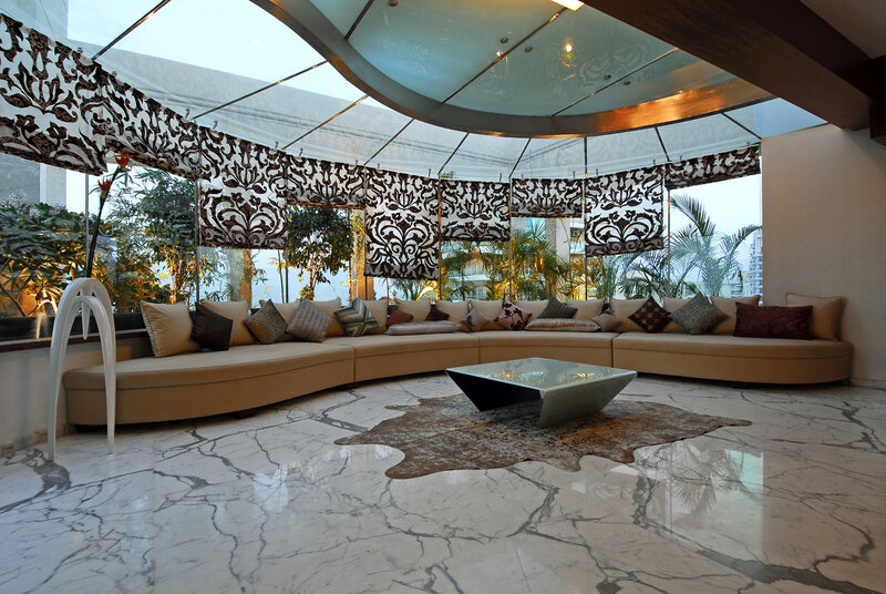 Curved Sofa in Glass Room