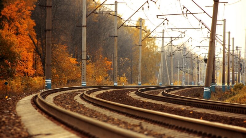 curved train tracks in autumn