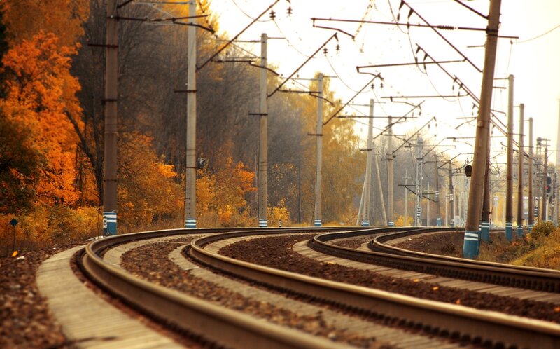 curving train tracks in autumn