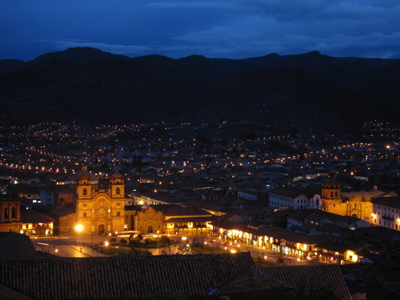 Cusco at dusk with mountains