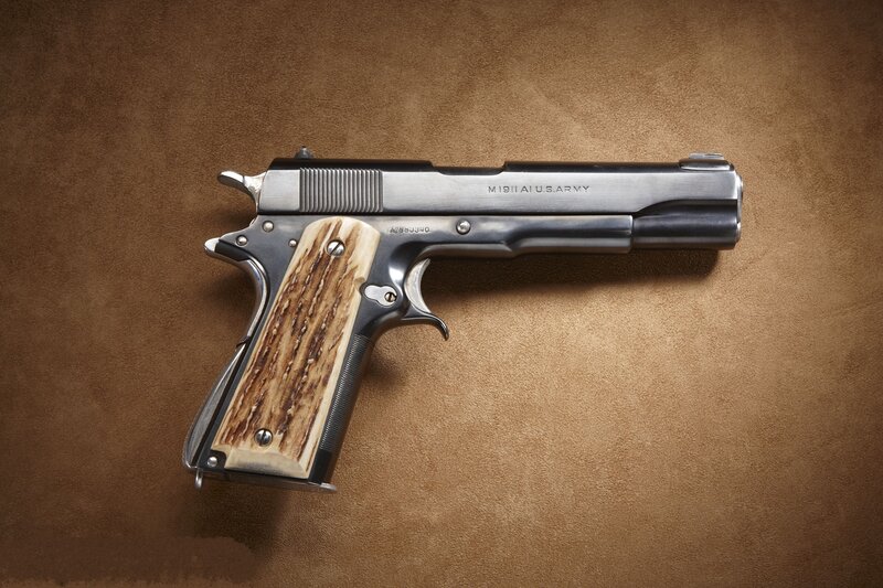 Custom 1911 pistol with bone grips