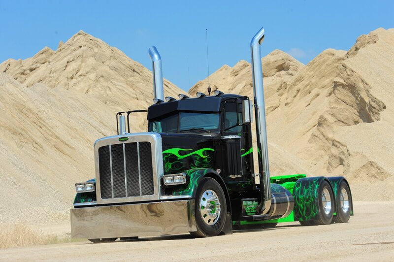 Custom black and green semi-truck