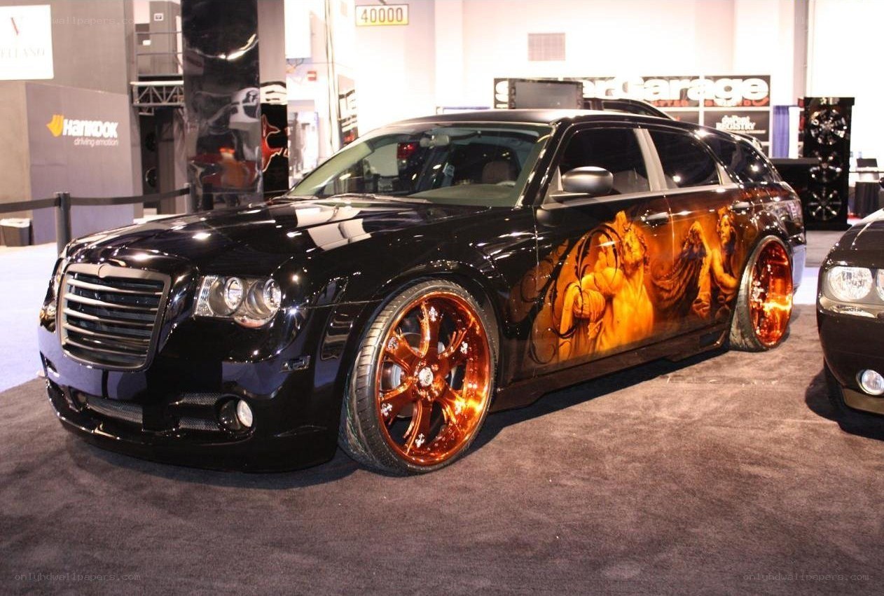 custom black car with flame design