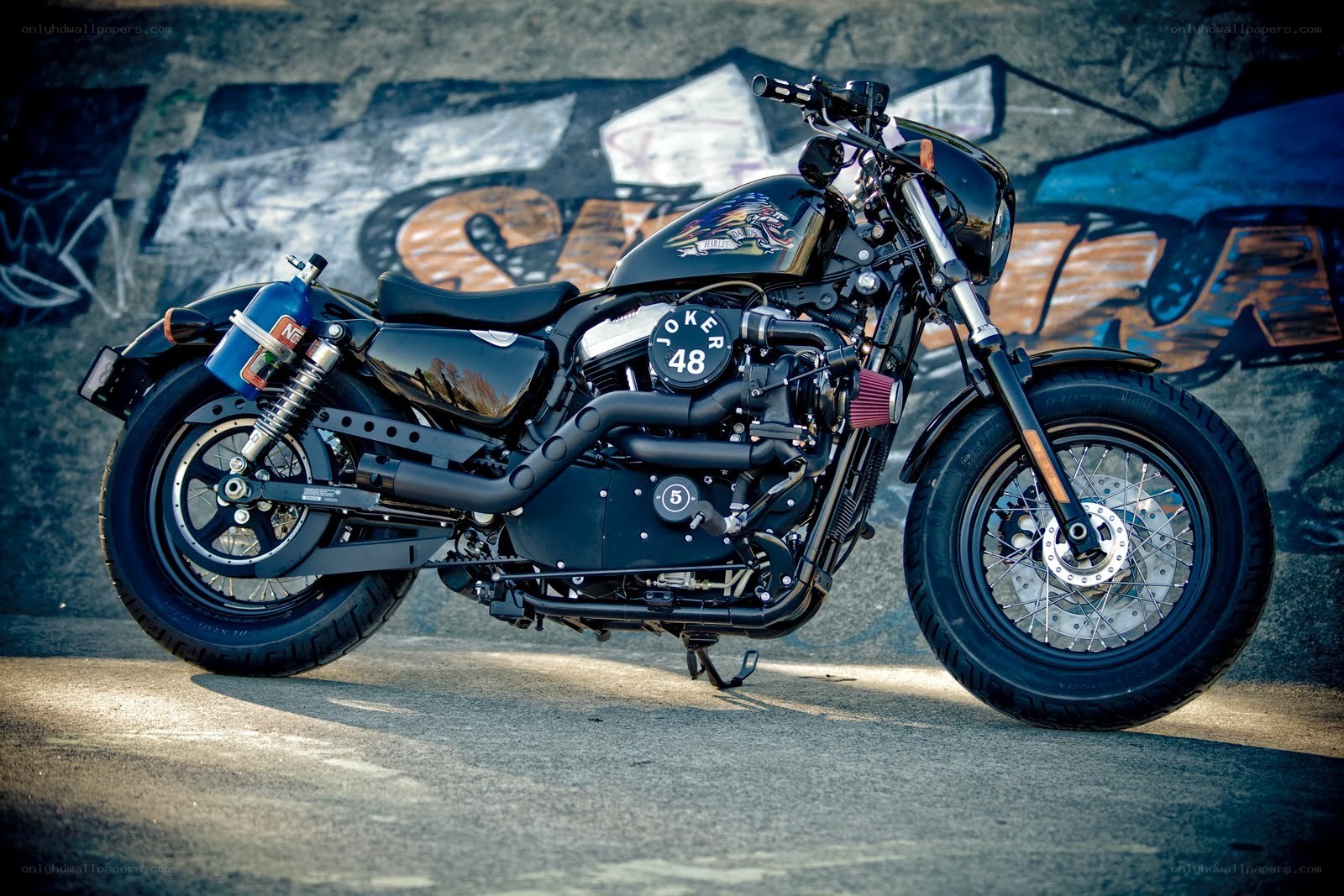 Custom black motorcycle with graffiti