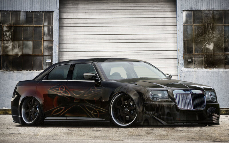custom black sedan with graphics