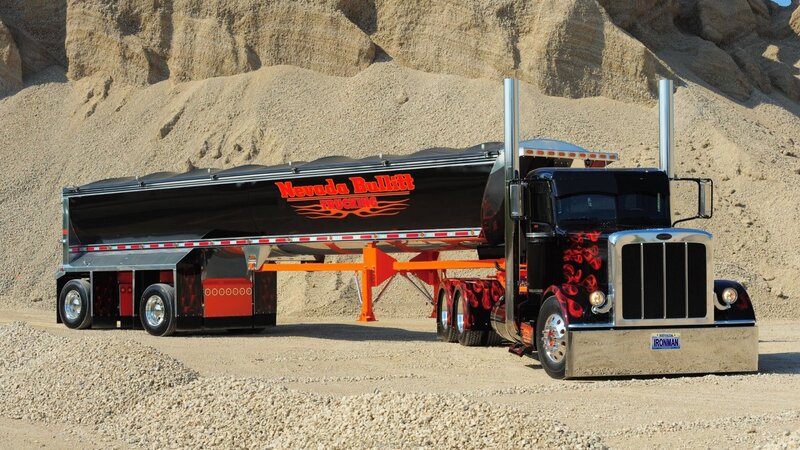 Custom black semi-truck with trailer