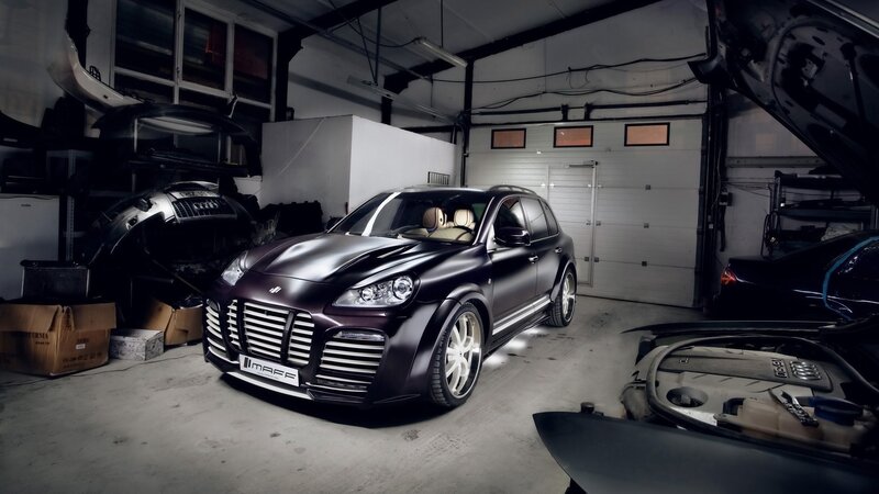 Custom black SUV in garage