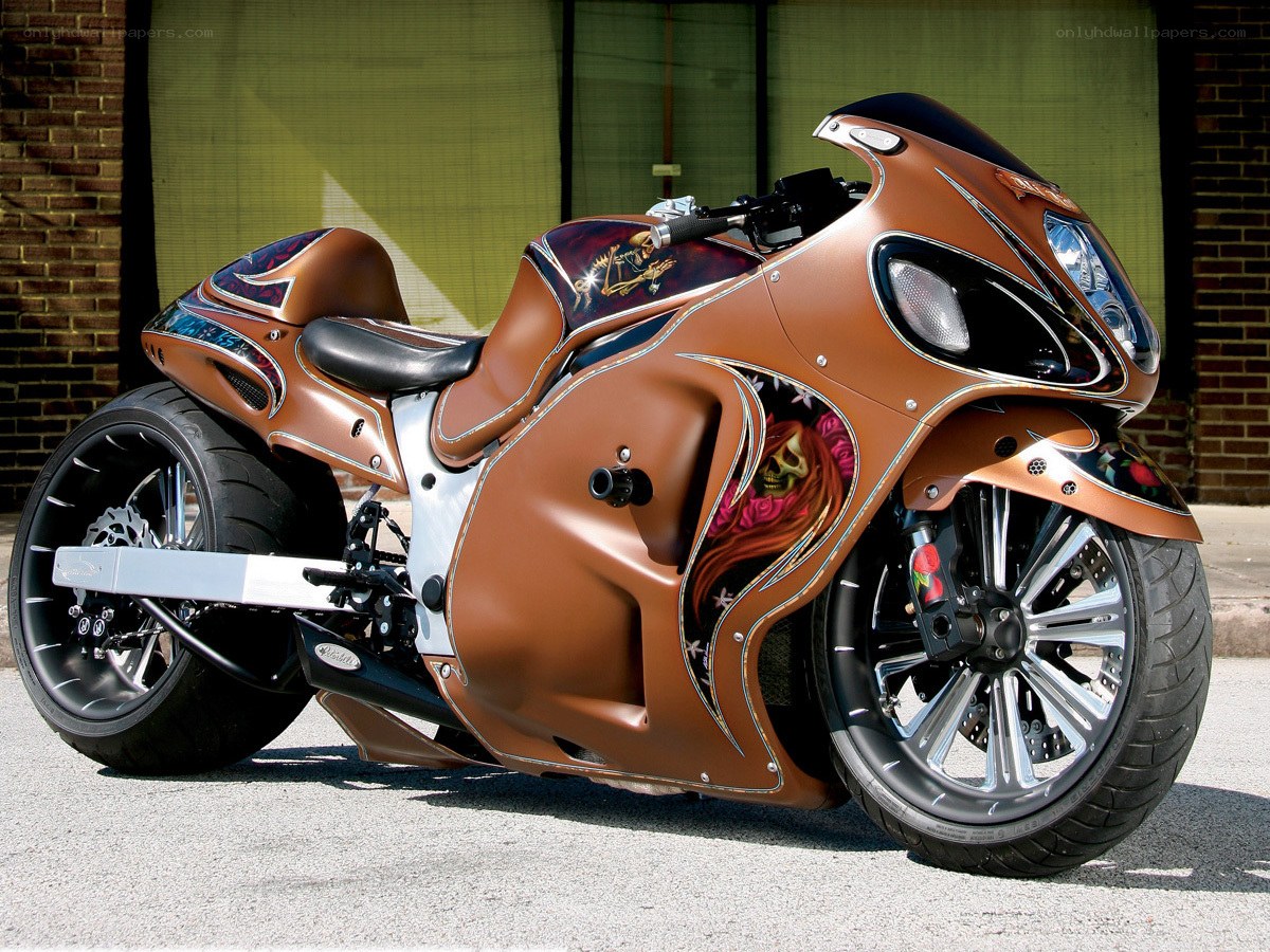 custom brown motorcycle with graphics