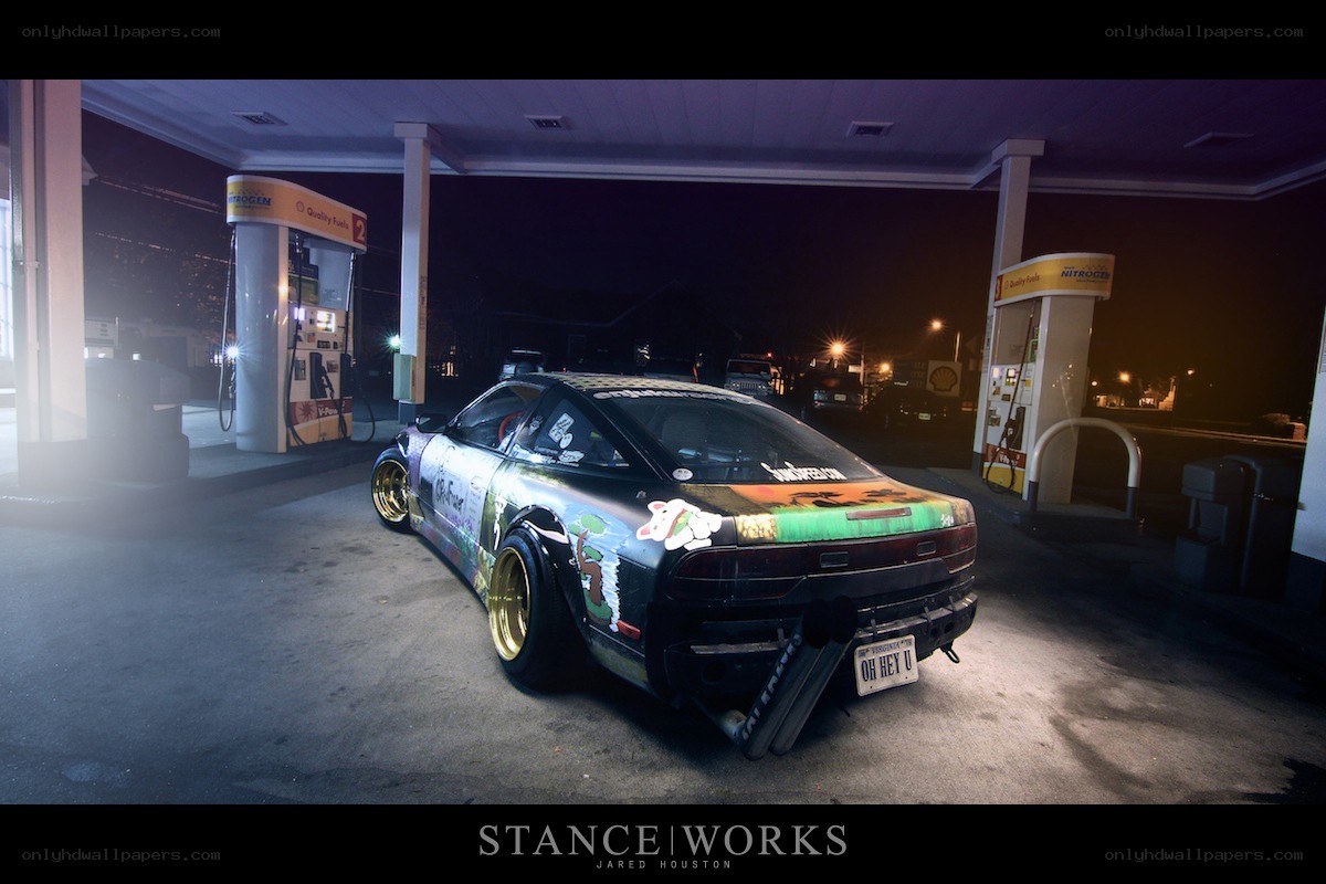 Custom car at a gas station