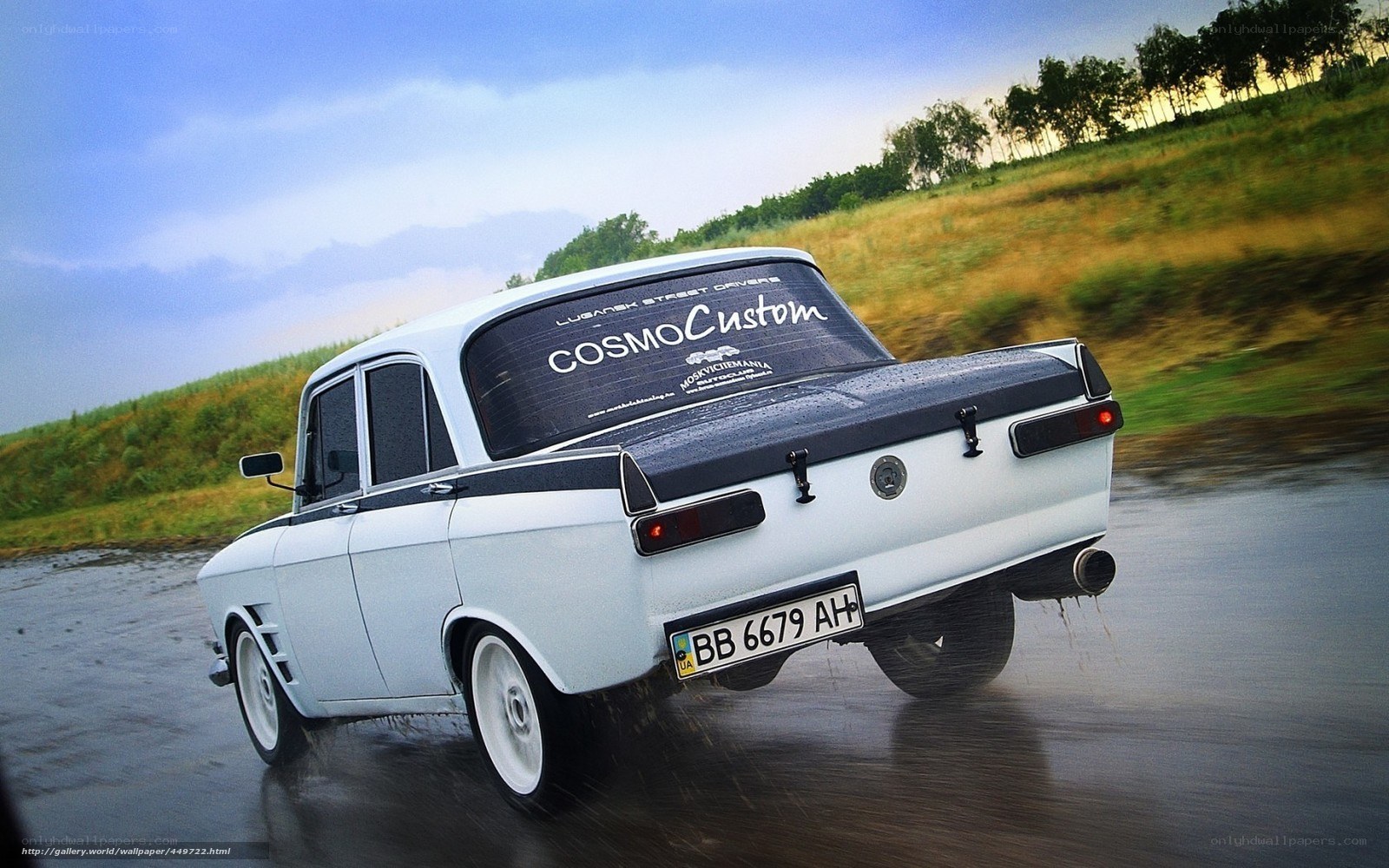 Custom car on wet road