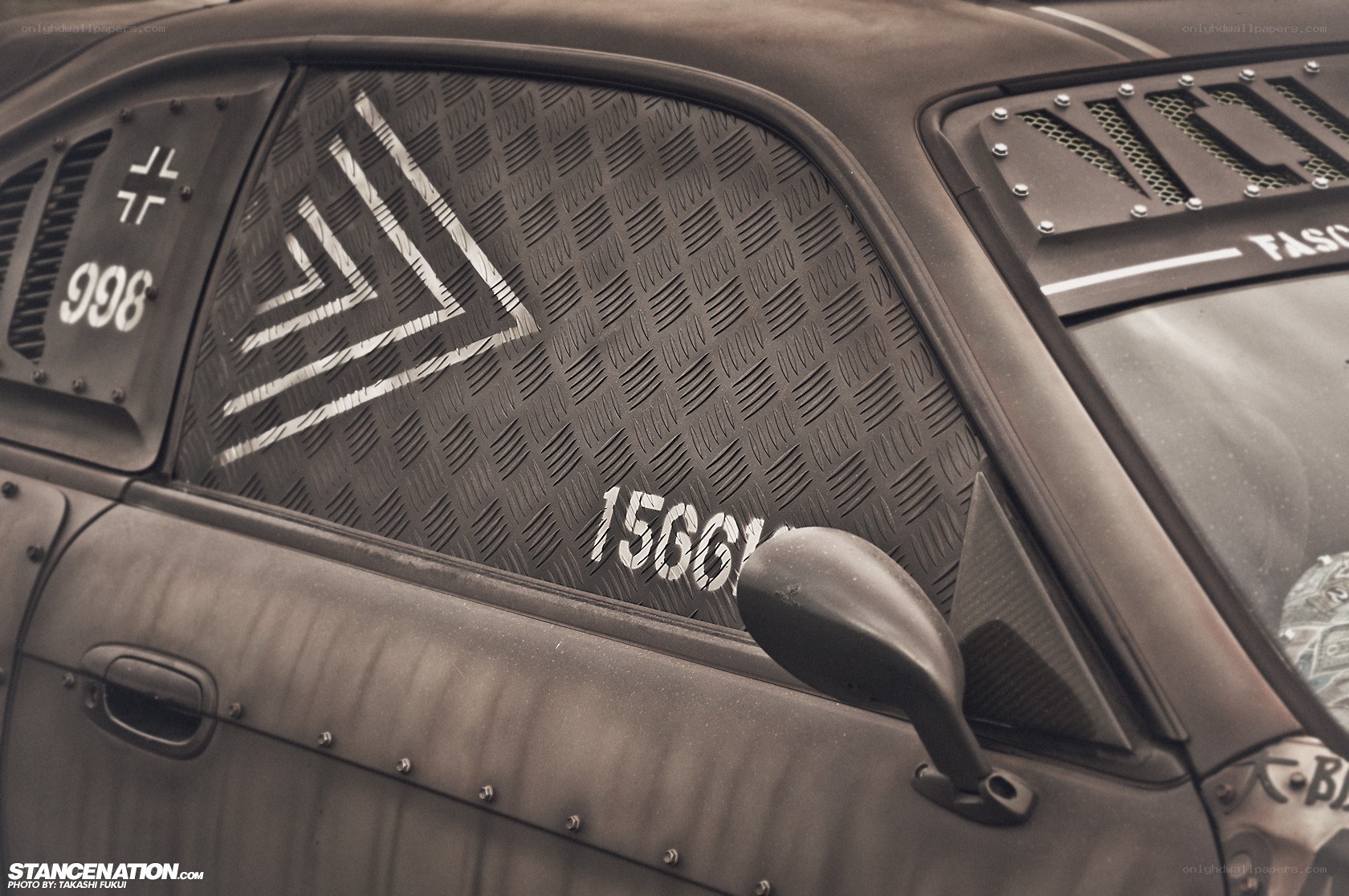 custom car with diamond plate window