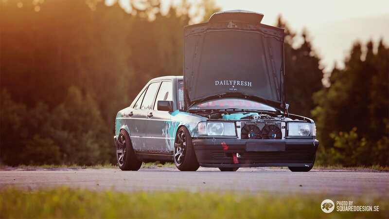 Custom car with open hood