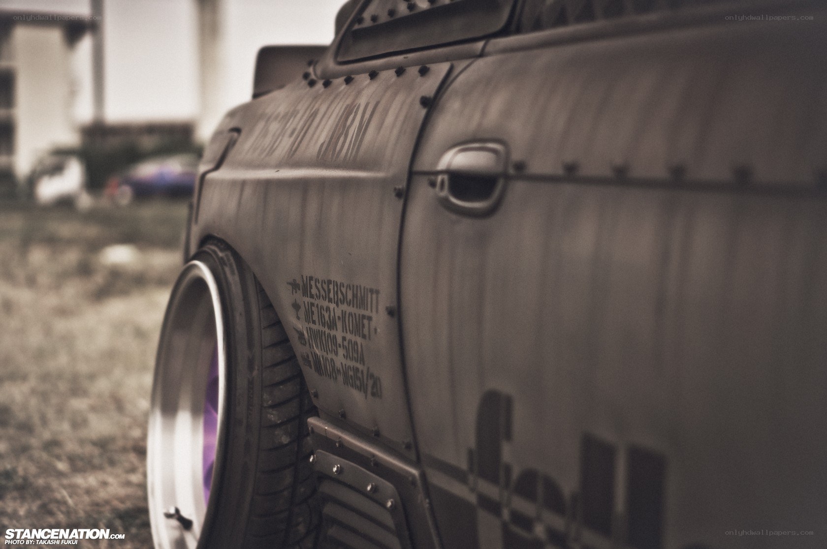 custom car with purple wheels