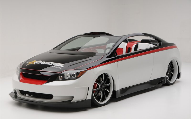 custom car with red and black accents