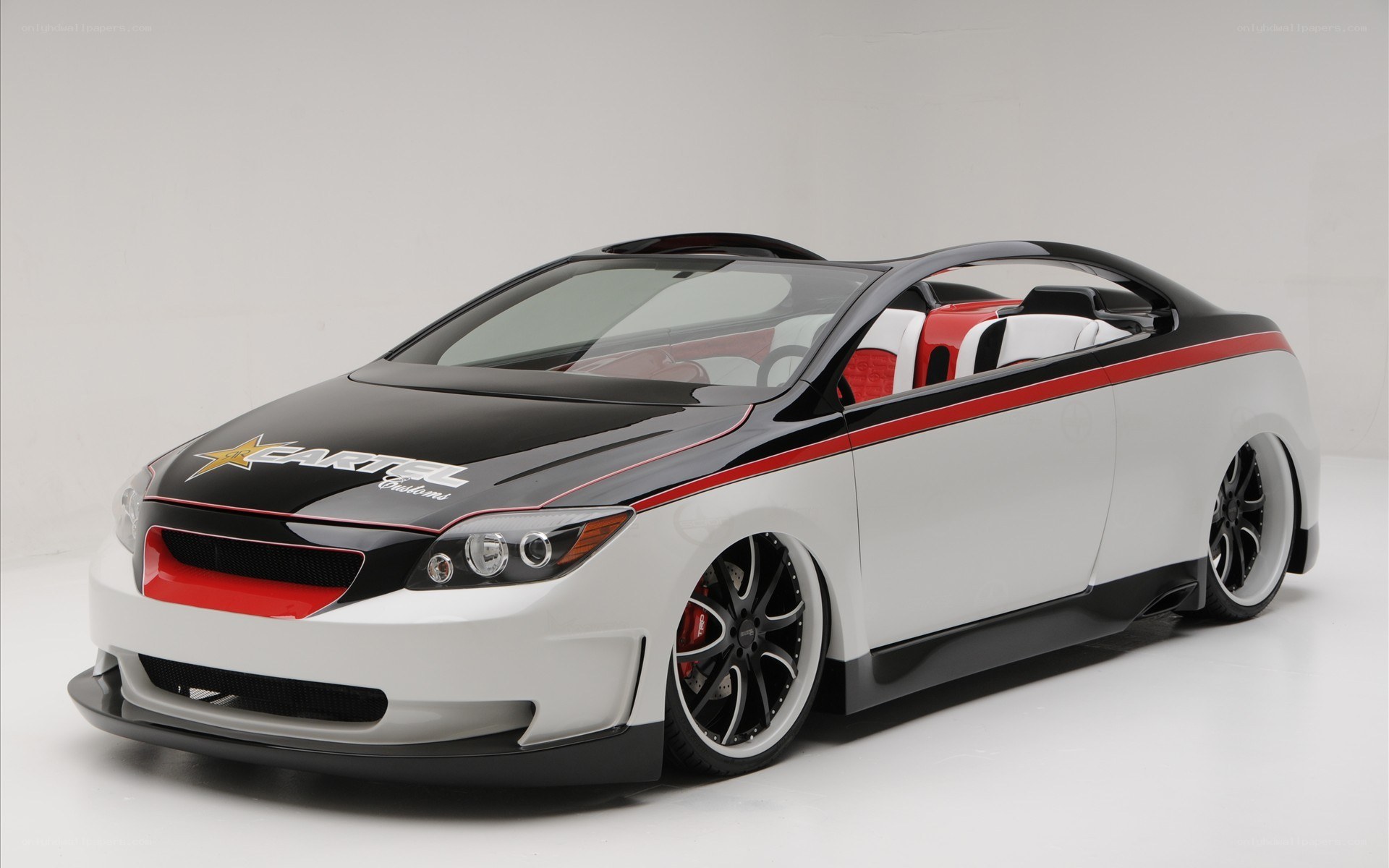 custom car with red and black accents