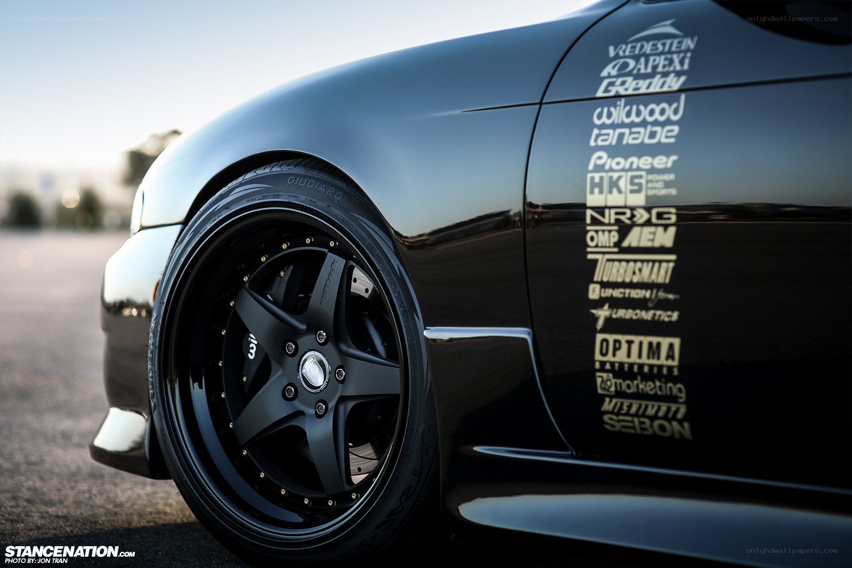 custom car with sponsor decals