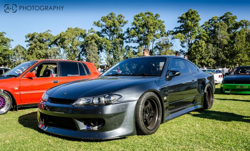Custom cars at outdoor show