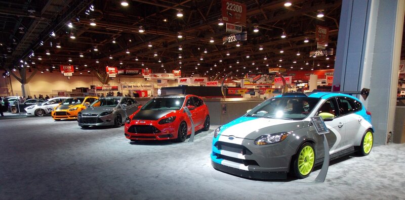 Custom cars on display at a show