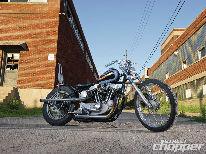 Custom Chopper Motorcycle — Black, Dramatic, Afternoon, Photograph, Brick Building