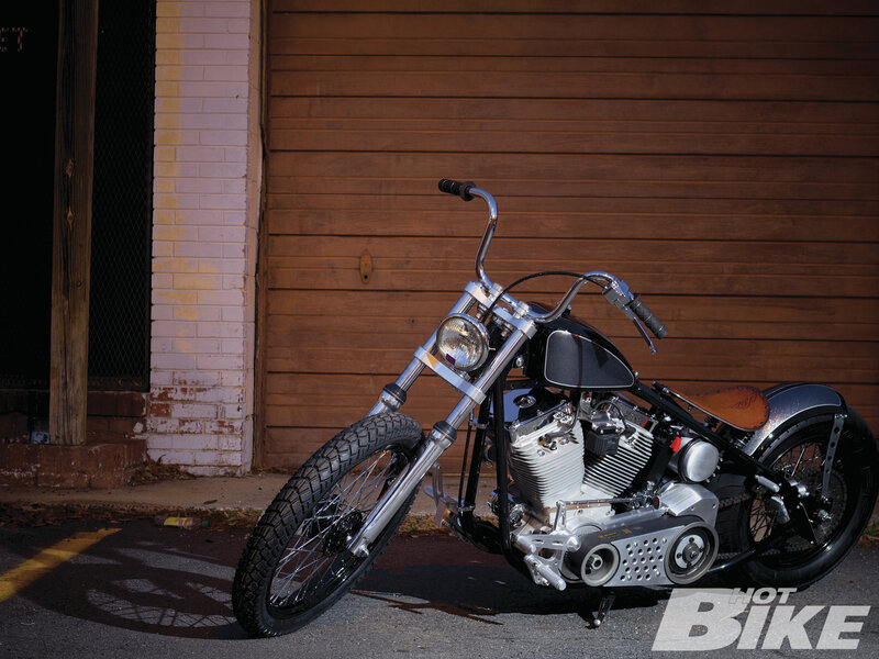 Custom Chopper Motorcycle — Black, Dramatic, Afternoon, Photograph, Wooden Wall
