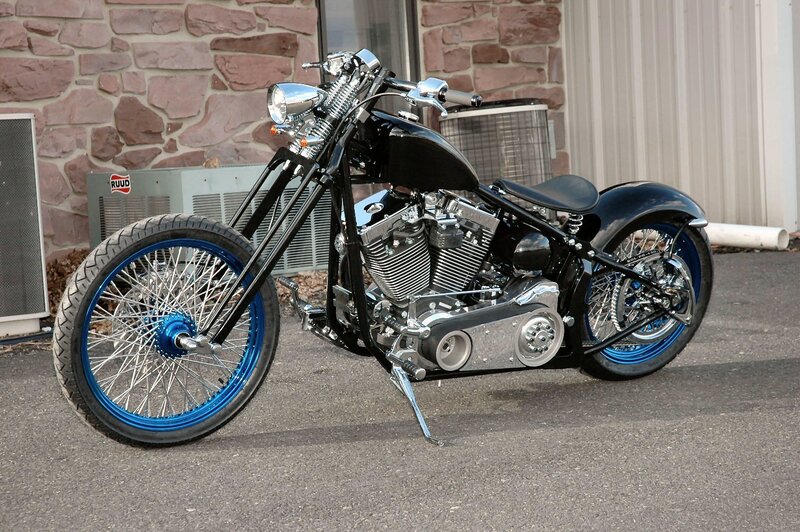 Custom Chopper Motorcycle — Black, Neutral, Afternoon, Photograph, Stone Wall