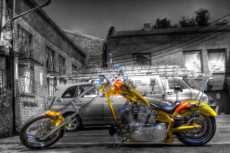 Custom chopper motorcycle in alley