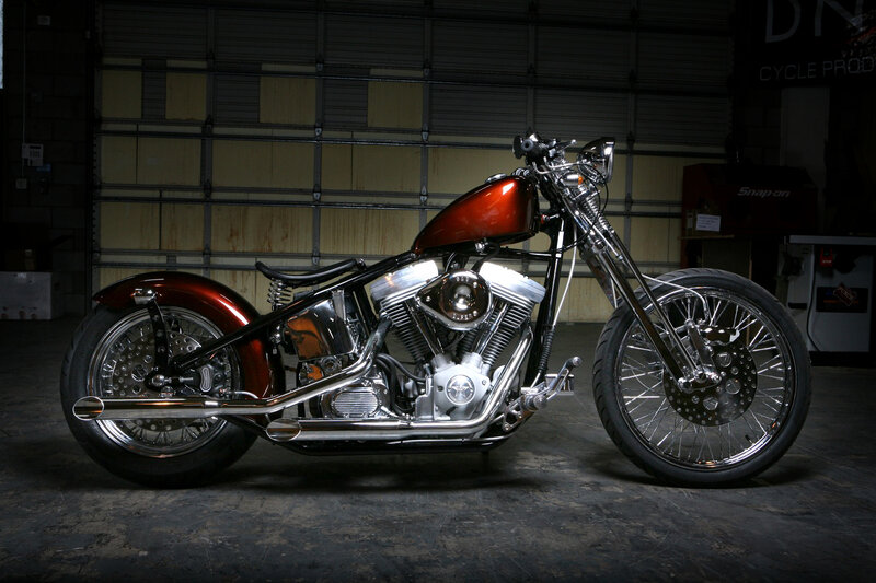 custom chopper motorcycle in garage
