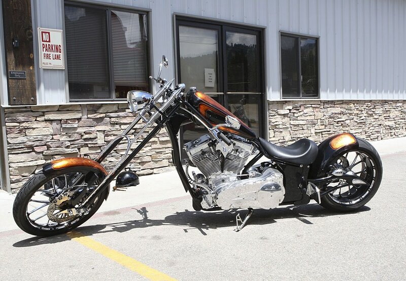 Custom chopper motorcycle parked outside