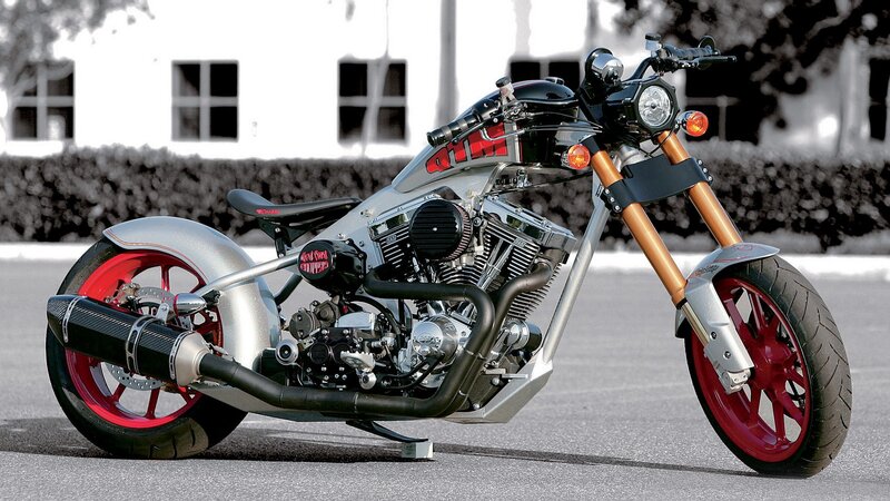 Custom Chopper Motorcycle — Silver, Dramatic, Afternoon, Photograph, Building, Hedge