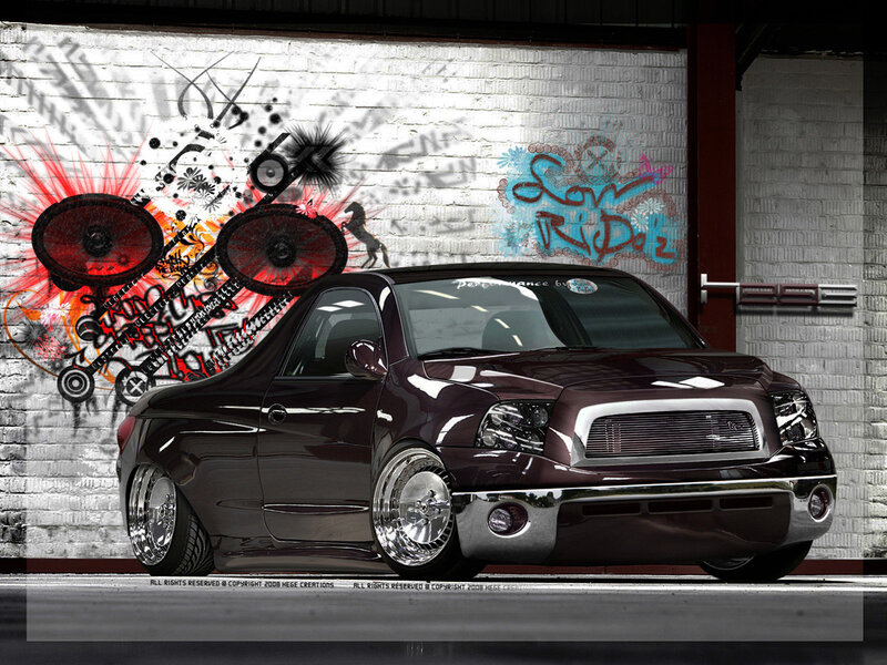 Custom dark purple truck with graffiti