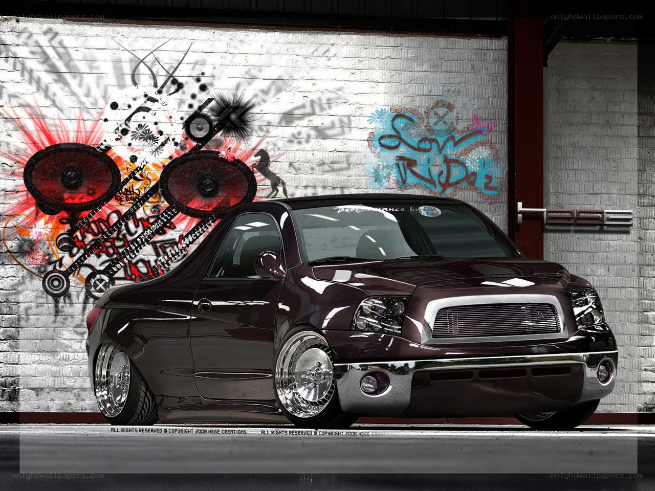 Custom dark purple truck with graffiti