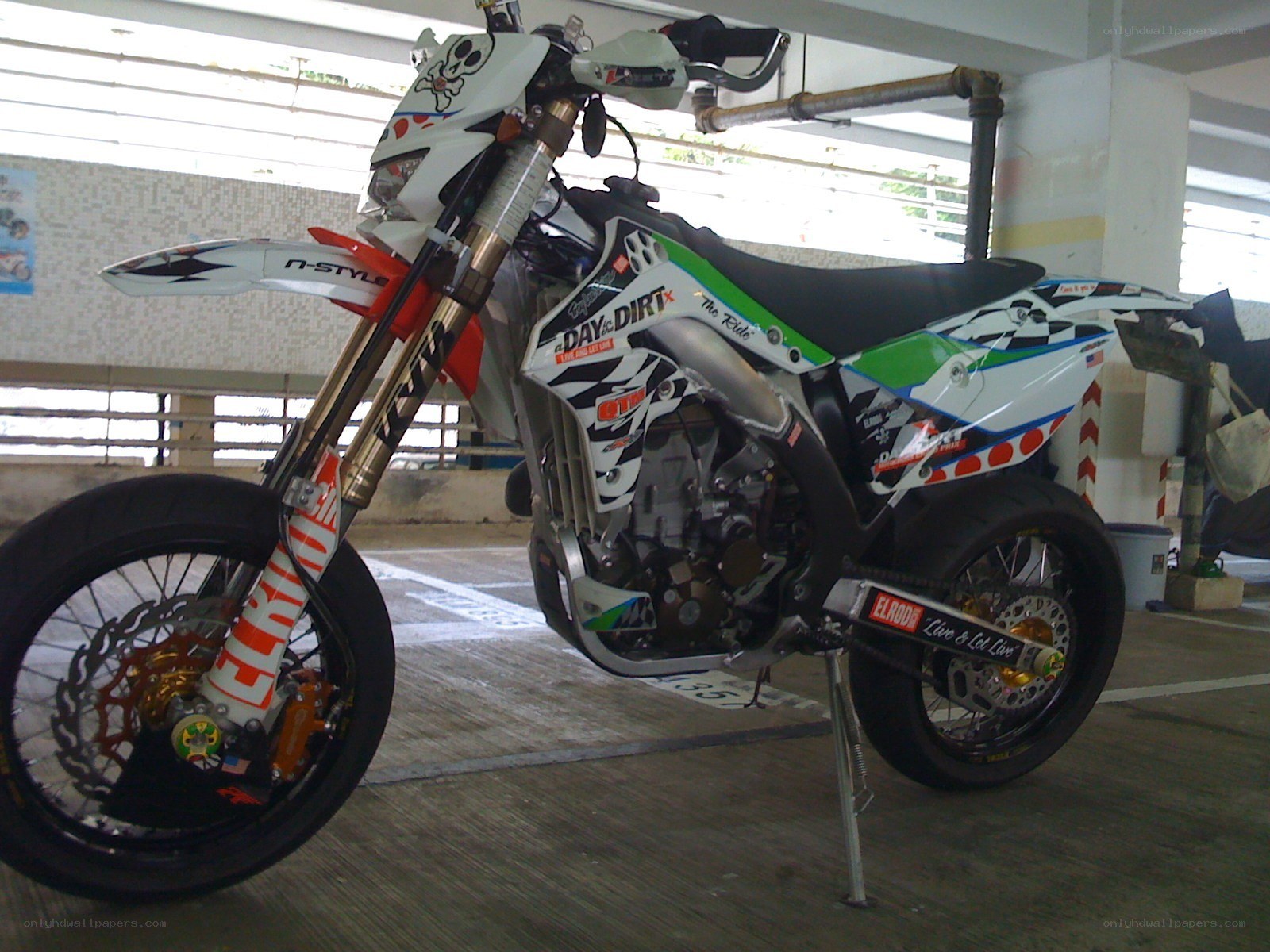 custom dirt bike in garage
