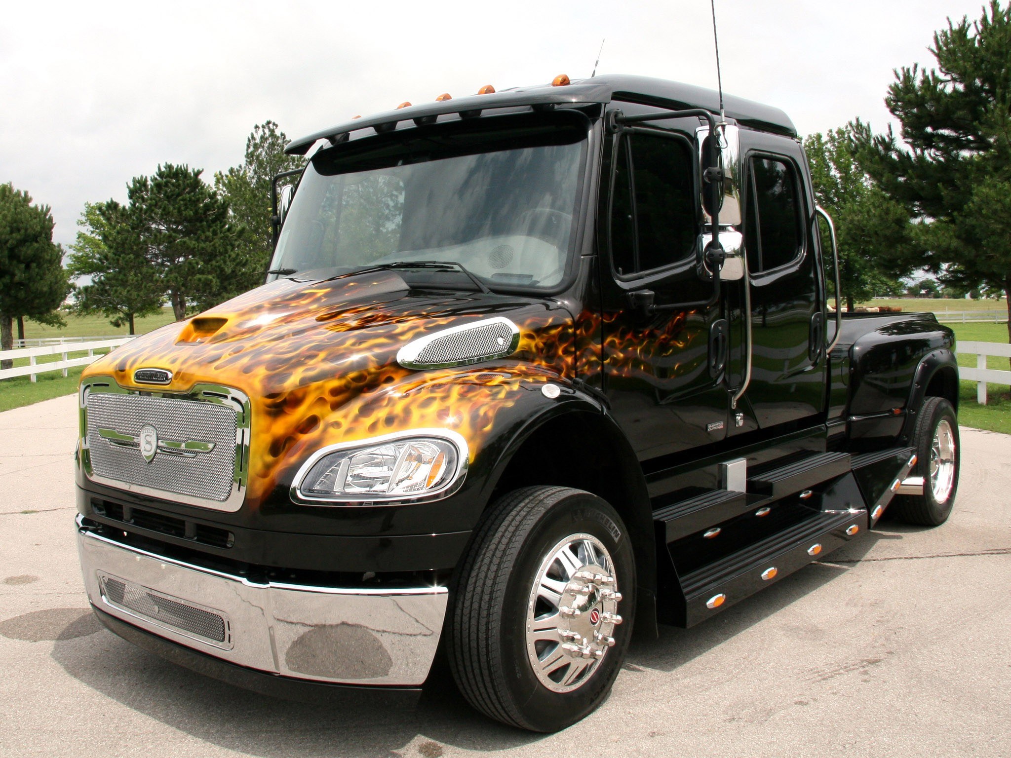Custom flame-painted black truck
