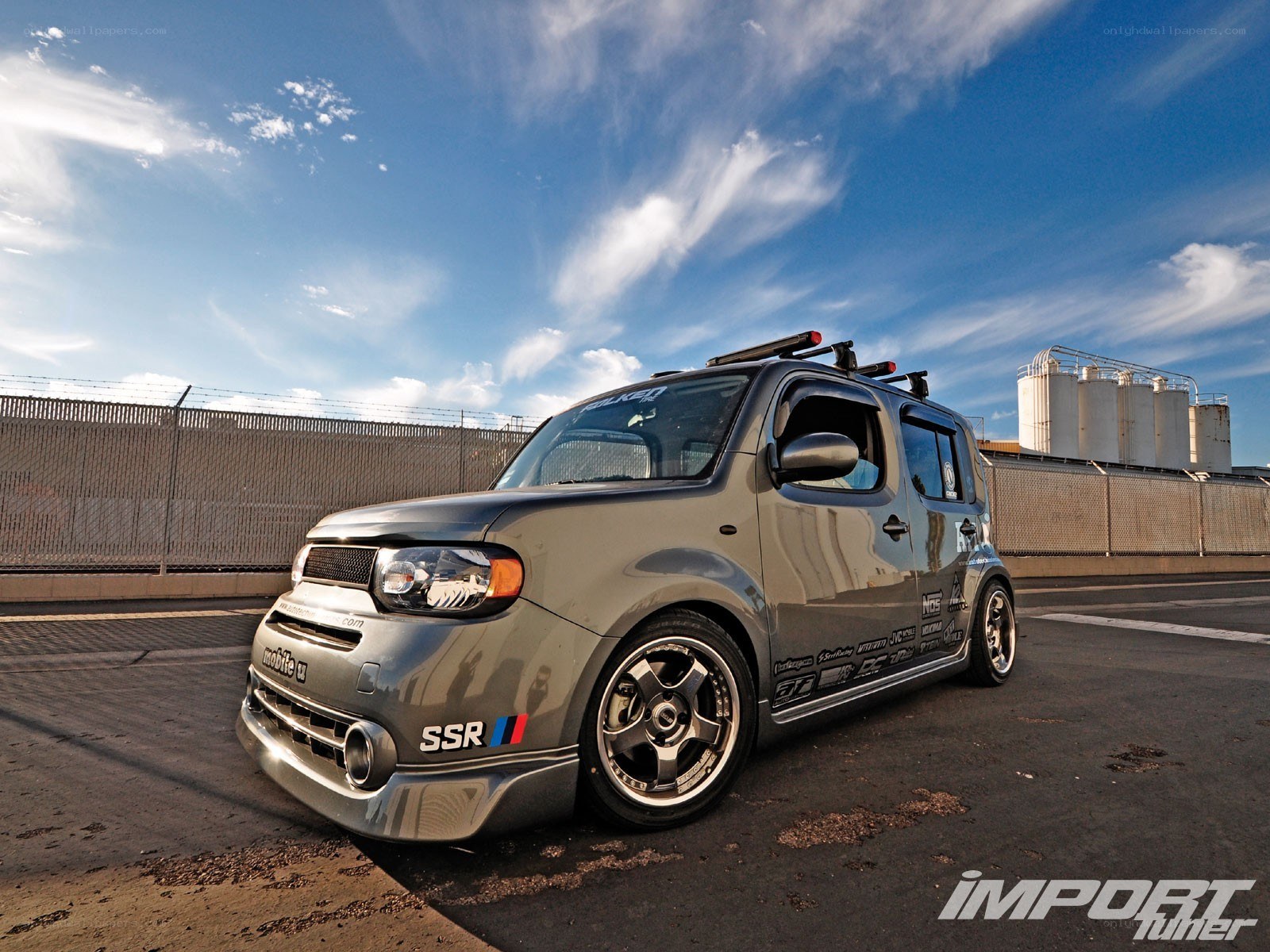 custom gray nissan cube on track