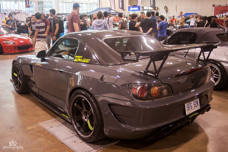 Custom gray sports car at auto show