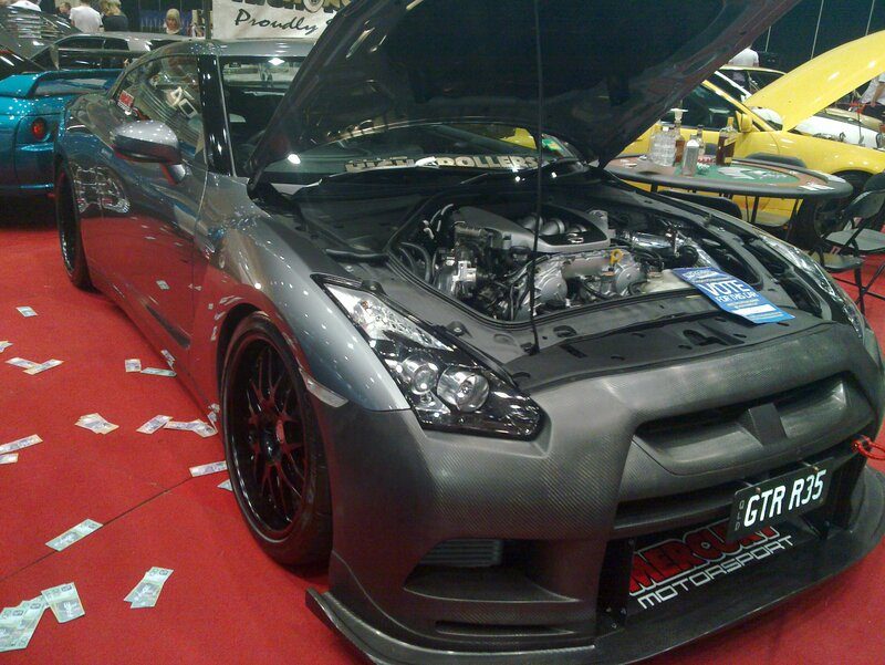 Custom gray sports car on display