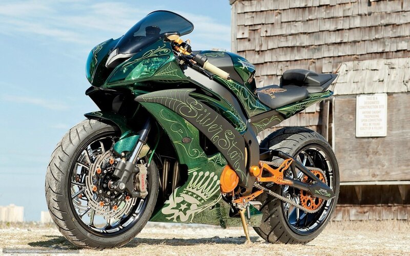 custom green motorcycle with graphics
