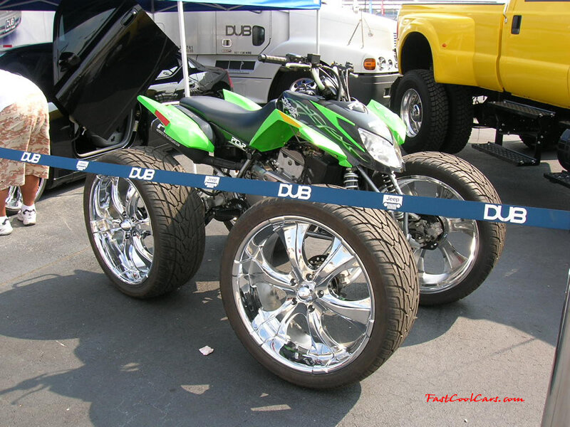 Custom green quad with large wheels