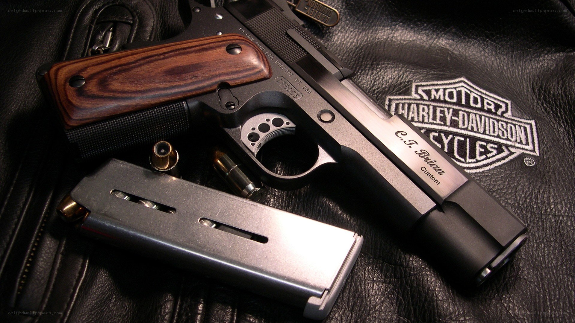 Custom handgun on leather jacket