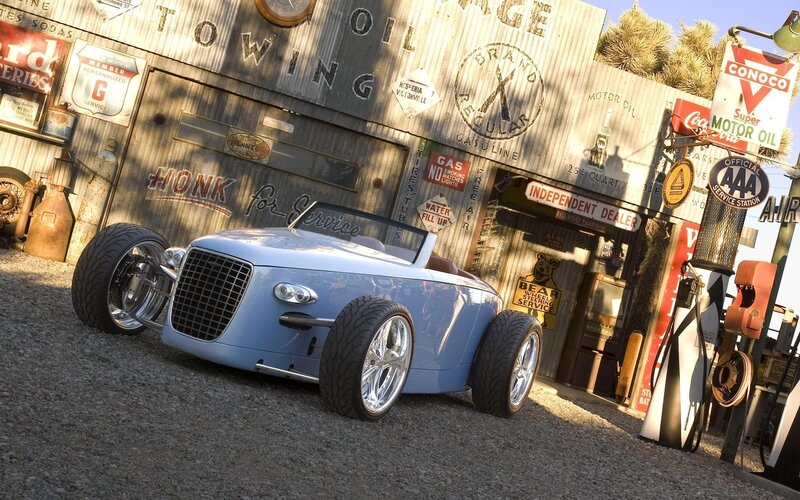 Custom hot rod at vintage gas station